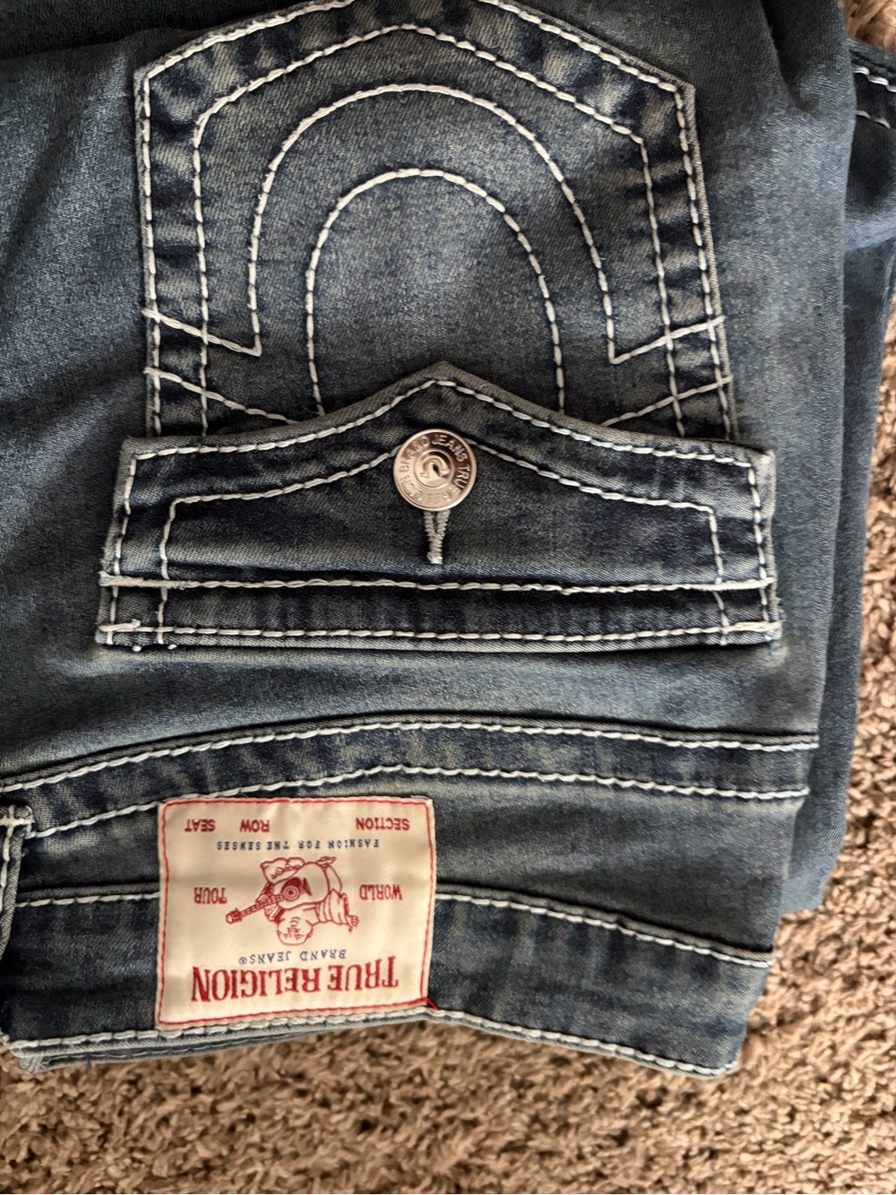 True Religion women’s Faded Blue Bootcut Jeans with Contrast Stitching